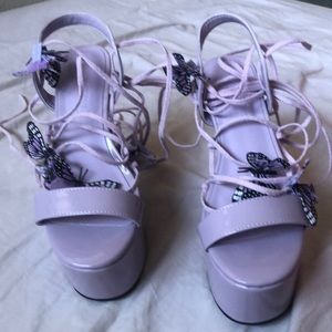 Butterfly Platform from Dollskill rarely used they are a size 6